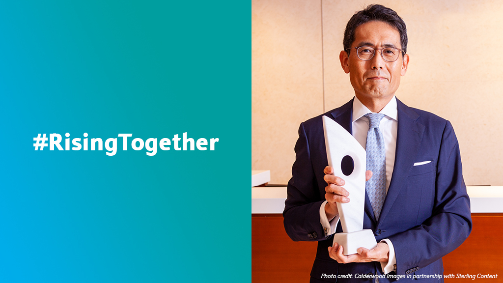Kentaro Kiso, President of Barclays Securities Japan Limited, with trophy from British Chamber of Commerce in Japan.