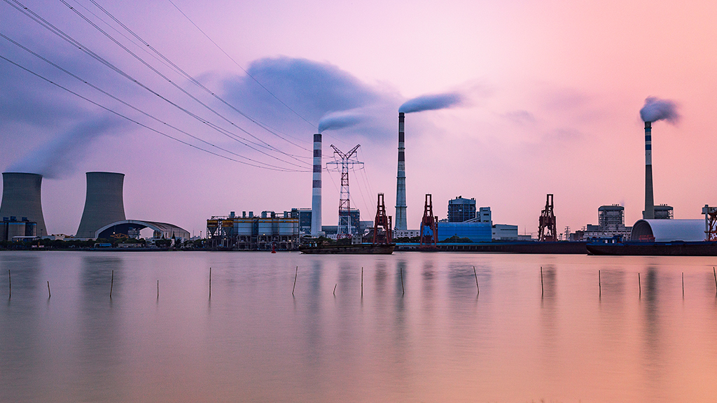 A power plant at sunset